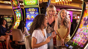 Ladies having fun winning at slots.