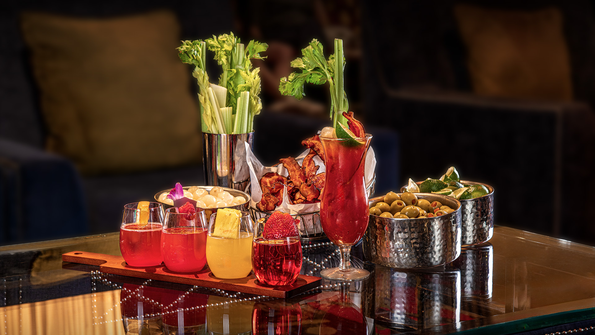 a table with drinks and snacks on it