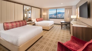 1_PHOTO_Concierge-Queen-Room-hero-view-of-bedroom_01_q085_1920x1080