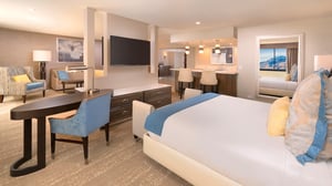 2_PHOTO_The-A-Director-Suite-view-of-bedroom-area_01_q085_1920x1080