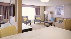 Sierra Director Suite view of dining and living areas.