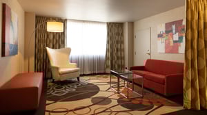 Summit Deluxe King Room view of living area.