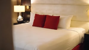 Summit Executive Suite detail view of bed. 