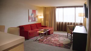 Summit Executive Suite view of dining and living areas.