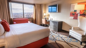 Summit King Room view of sleeping and living areas.