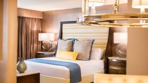 The-A-Executive-Suite-stylized-view-of-bedroom-area_q085_1920x1080