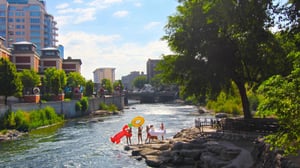 Truckee River Downtown Reno people with inflatables.
