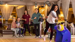 Photo of friends bowling and relaxing at Kingpin VIP Lanes & Lounge at GSR.