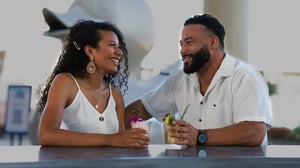 Photo of young couple enjoying drinks at The Pool Bar.
